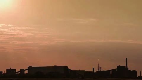 Silhouette of a iron ore processing plant, Opencast mining of iron ore in the Video stock 94453878