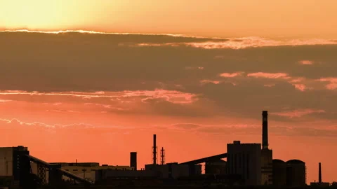 Silhouette of a iron ore processing plant, Opencast mining of iron ore in the Video stock 94454092