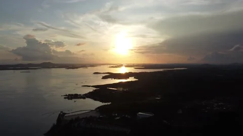 Silhouette island sunset Stock Footage 154355978