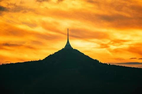 Silhouette of Jested mountain with dramatic cloudscape at sunset time- Foto stock