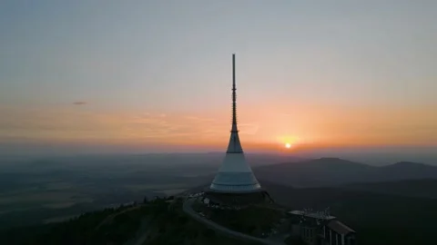 Silhouette of Jested Tower with sun setting in background Stock Footage 200101681