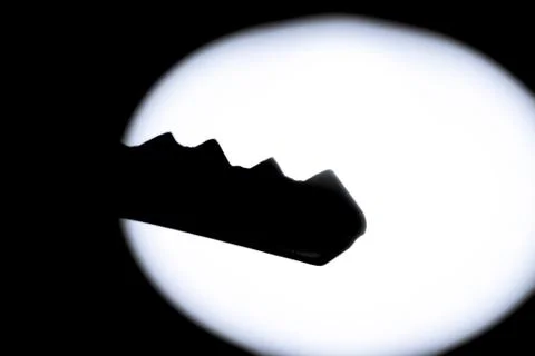 Silhouette of a key Stock Photos