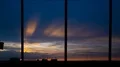 The silhouette of kissing couple and walking people near the airport window 4k or 4k+ Resolution