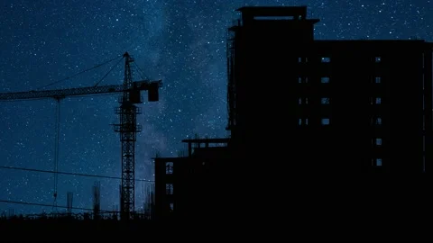 Silhouette of a Large Tower Crane at a Construction Site Video stock 239660253