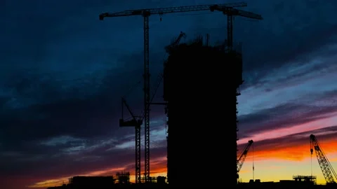 Silhouette of a Large Tower Crane at a Construction Site Video stock 239941315