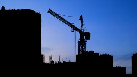 Silhouette of a Large Tower Crane on a Construction Site Stock Footage 240119687