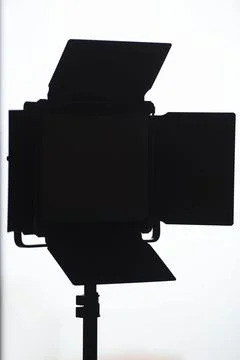 Silhouette of an LED studio light panel. Stock Photos