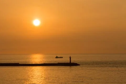 Silhouette of a lighthouse Stock Photos