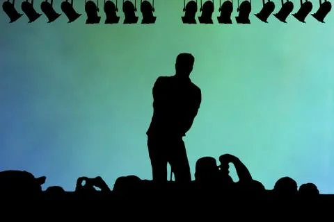 Silhouette of a live performer on stage Stock Illustration