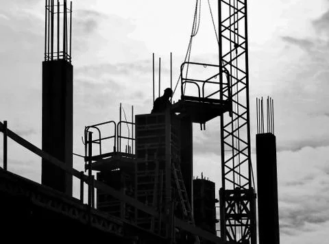 Silhouette looking construction worker Stock Photos