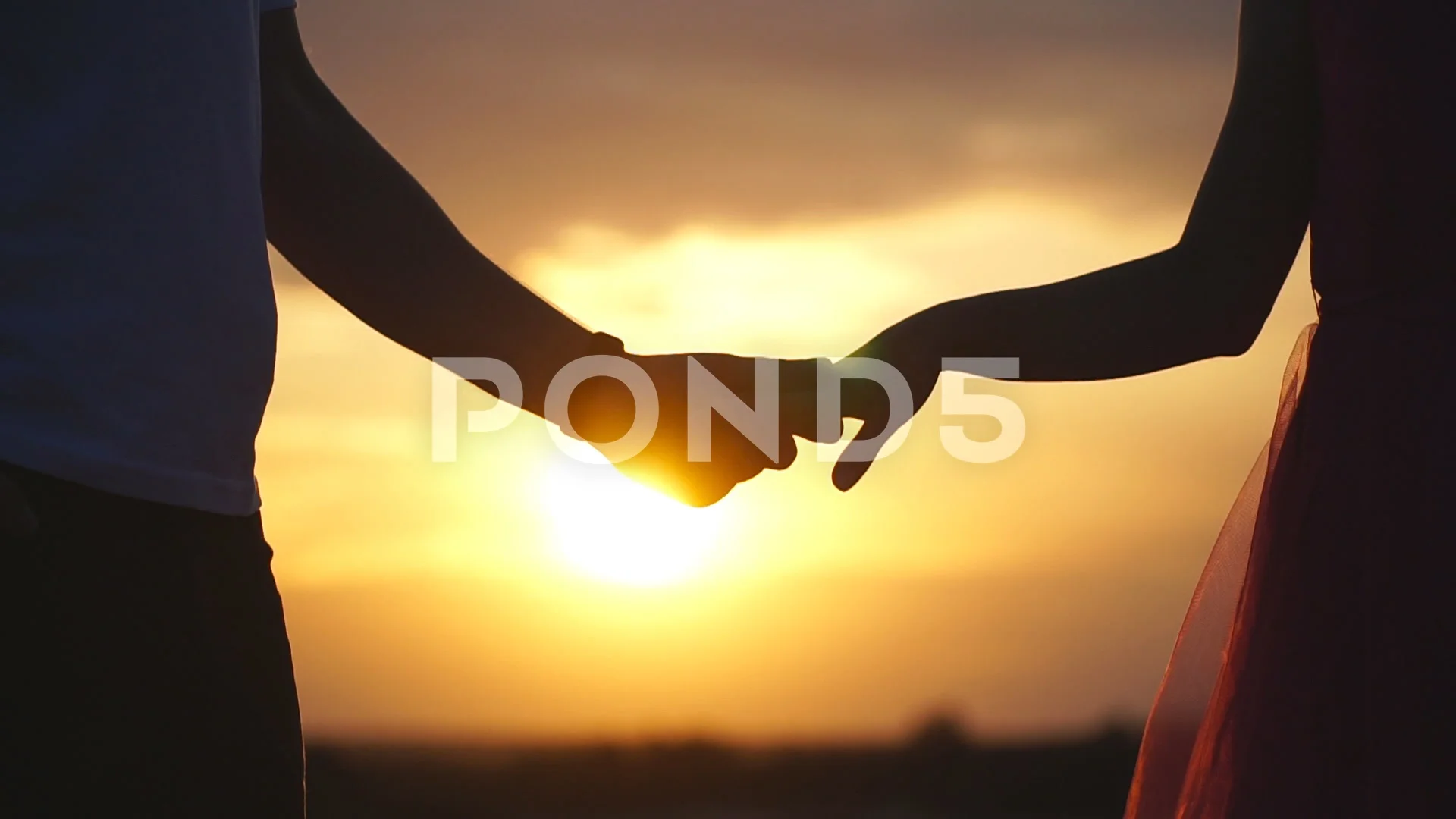 Silhouette Of Male And Female Hands Hold Stock Video Pond5