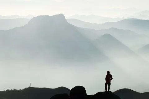 Silhouette of man and mist. Fotos Stock