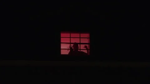 Silhouette of Man Banging on Window From, Stock Video