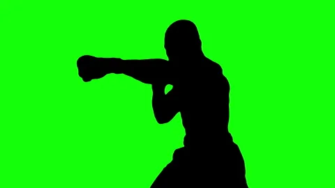 Silhouette of man boxing on green background. Stock Footage 339995705