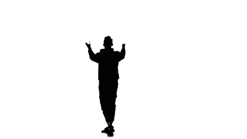 Silhouette of man dancer dancing hip hop, freestyle, street dance, slow motion Stock Footage 130334724