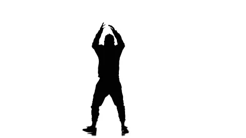 Silhouette of man dancer dancing hip hop, freestyle, street dance, slow motion Stock Footage 130334890