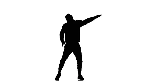 Silhouette of man dancer dancing hip hop, freestyle, street dance, slow motion Stock Footage 130334908