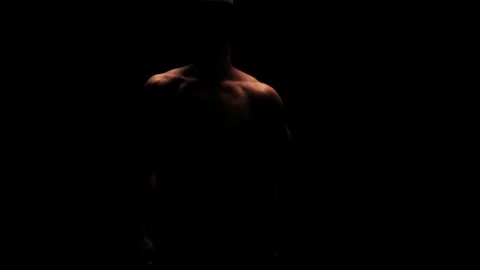 Silhouette of a man dancing in the dark Stock-Footage 92540789