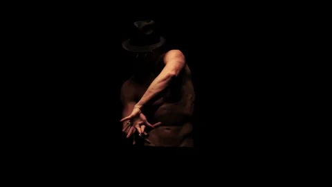 Silhouette of a man dancing in the dark 動画素材 92540822