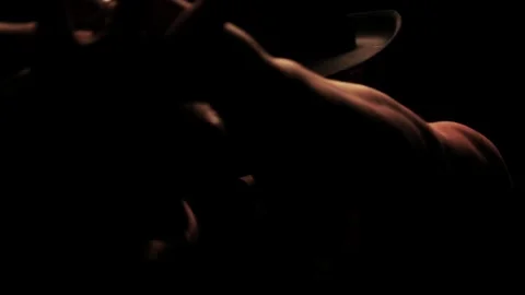 Silhouette of a man dancing in the dark Video stock 92540857