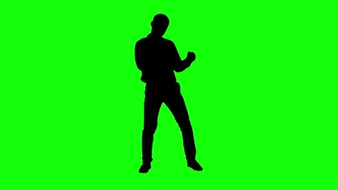 Silhouette man dancing on green background. Stock Footage 337548630