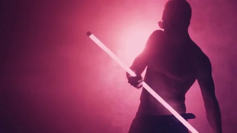 Silhouette of man dancing with lamp in smoke Stock-Footage 80661757