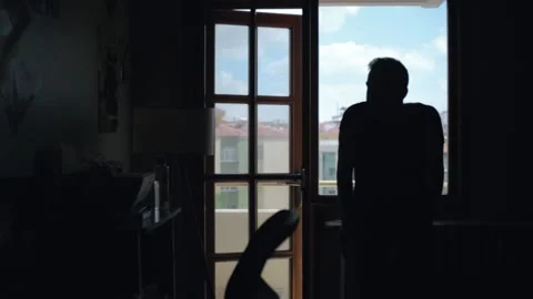 Silhouette of a Man Deep in Thought Stock Footage 202213505