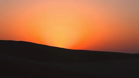 Silhouette of a man in the desert Stock Footage 104885563