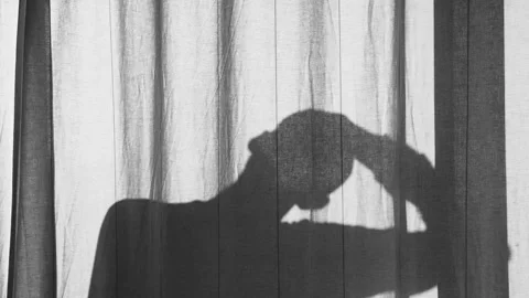 Silhouette of a man doing a workout. Warm up on a sunny day. Sport and healthy Stock Footage 146445401