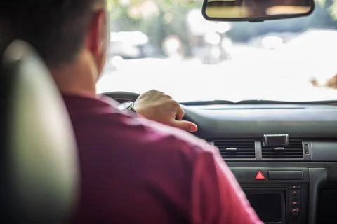 Silhouette of a man driver. Stock Photos