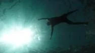 Silhouette Man Drowning Sinking Body In Deep Water Slow Motion Underwater Shot Stock Footage