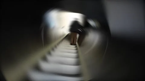 Silhouette of man going up on escalator Stock Footage 54649031