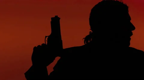Silhouette man gun guarding zone red Stock Footage