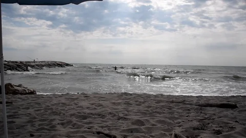 Silhouette of a man in the ocean Video stock 112647355