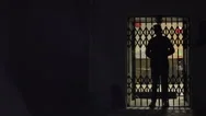 Silhouette Of A Man Opens The Sliding Doors Stock Footage
