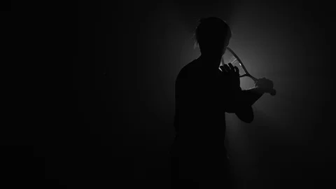 Silhouette of man playing squash Stock Footage 104065418