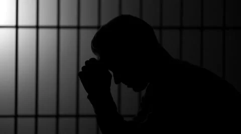 Silhouette of a man in prison (B/W Version) Stock Footage 60581477