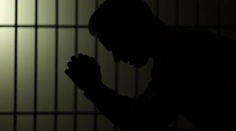 Silhouette of a man in prison Stock Footage