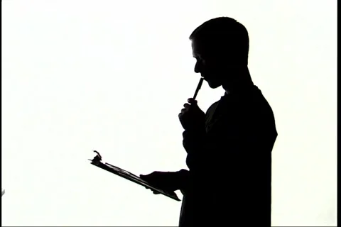 Silhouette, Man Reviewing Document Stock Footage 298319