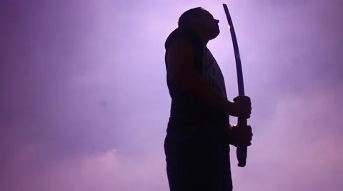 Silhouette man with samurai sword Stock Footage 48897490