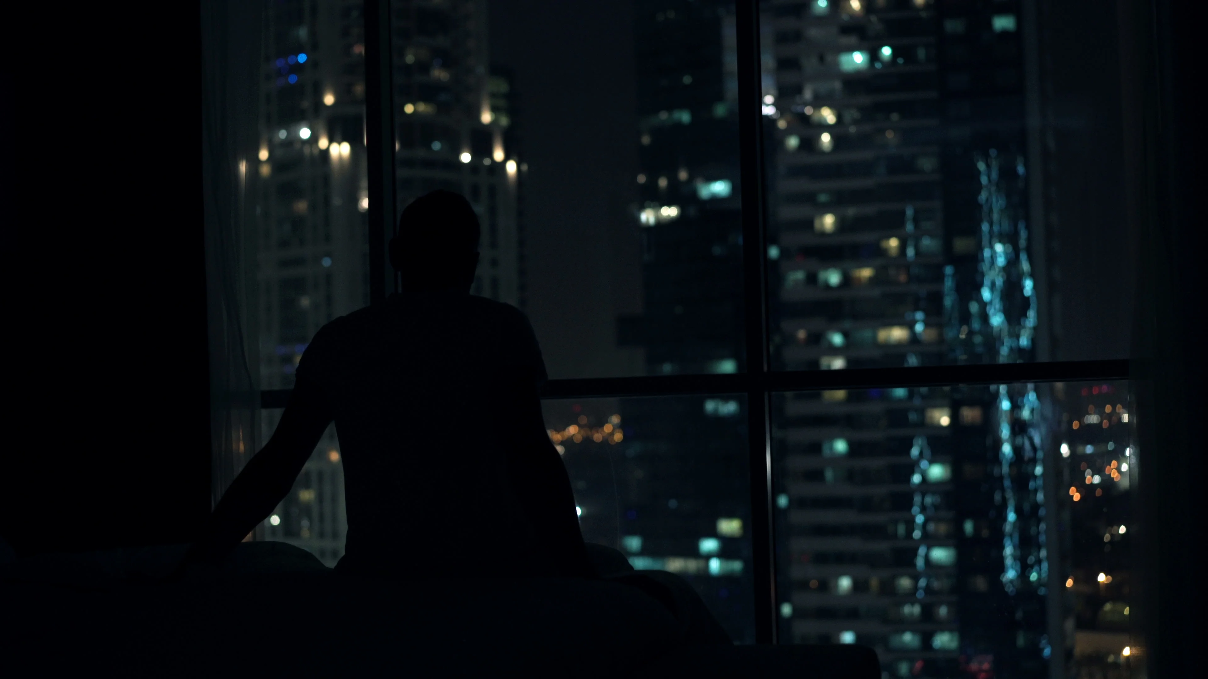 Silhouette Of Man Against Window by Stocksy Contributor