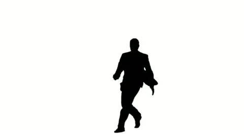 Silhouette of a man in slow motion jumping Stock Footage 10851549