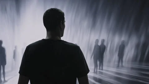 Silhouette Man Standing Before Ghostly Crowd Dramatic Ethereal Mysterious Scene Video stock 288886135