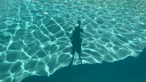 Silhouette Of A Man Standing To Reflective Pool Stock Footage 207970974