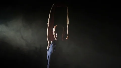 Silhouette of man stretching Video stock 82660131