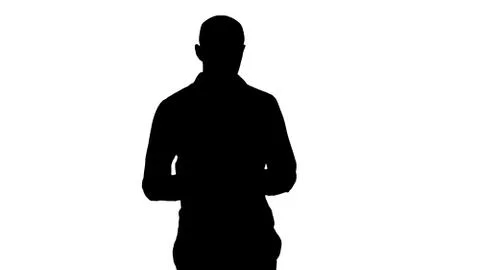 Silhouette Man text messaging while walking. Stock-Illustration