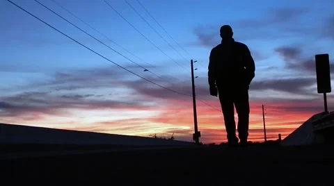 Silhouette of man walking closer Video stock 45290253