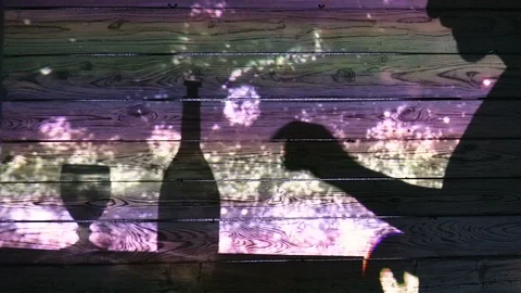 The silhouette of a man who drinks alcohol Stock Footage 99391953