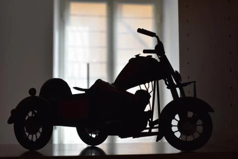 Silhouette of a model motorcycle. Stock Photos