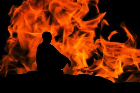 Silhouette of a monk Stock Photos